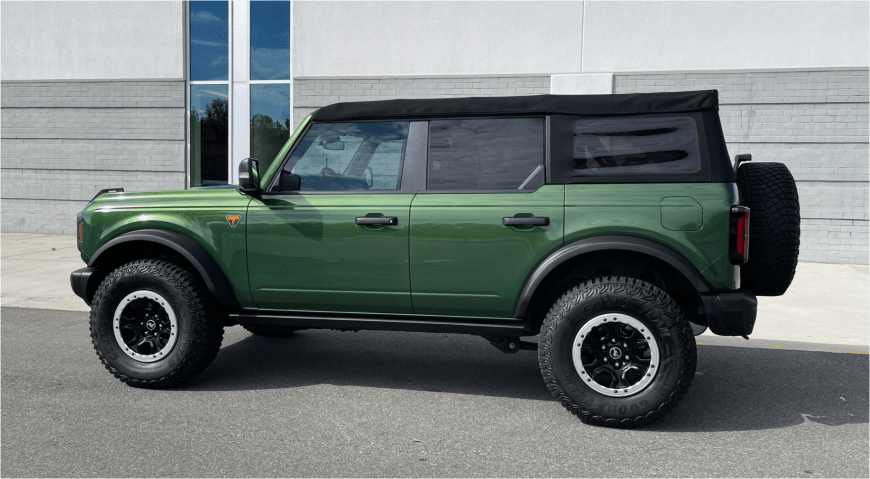 Green vehicle with soft top
