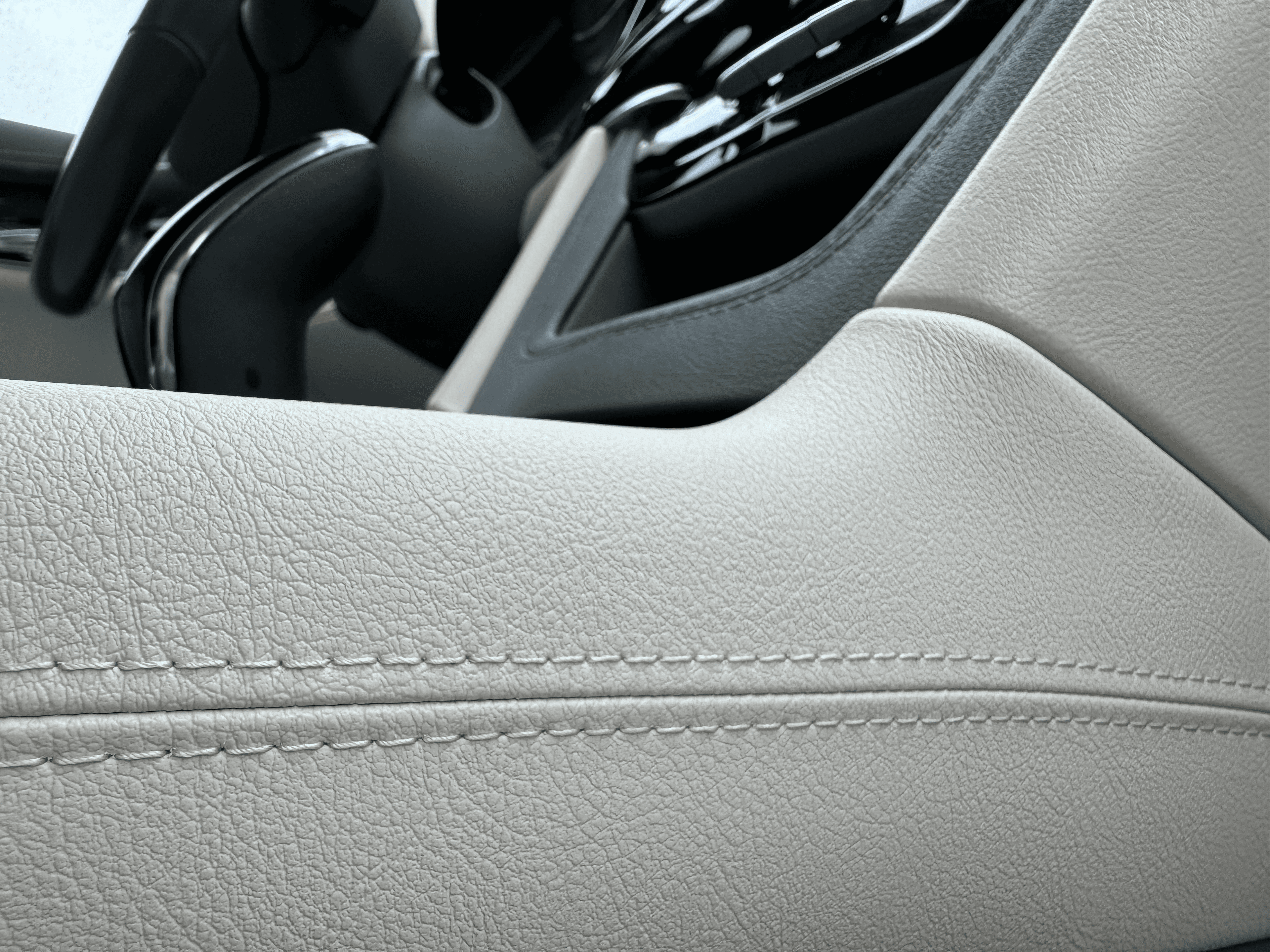 Close up interior stitch shot of middle console
