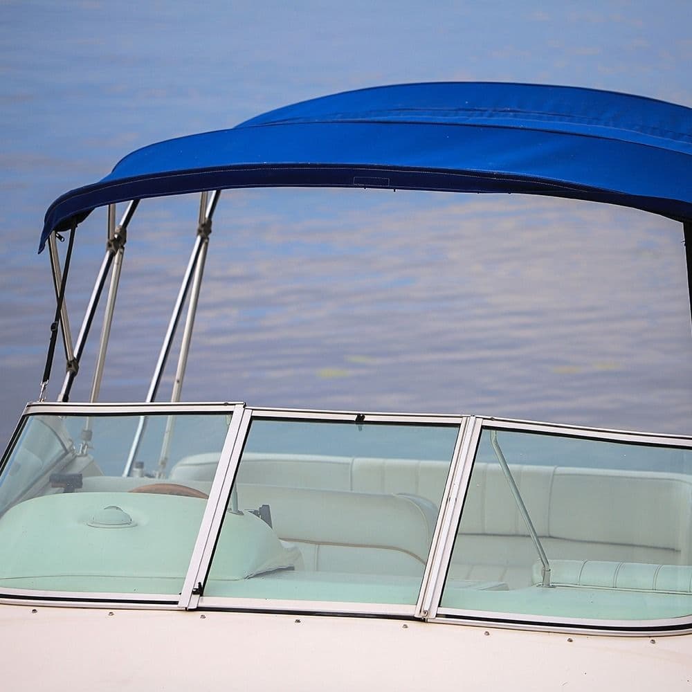 Boat with Blue soft cover roof