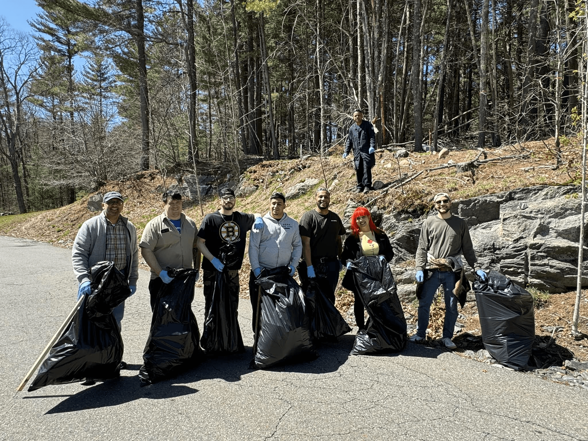 Haartz employees picking up trash for Earth day