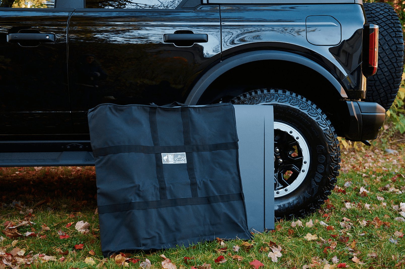 Storage bag infront of vehicle tire