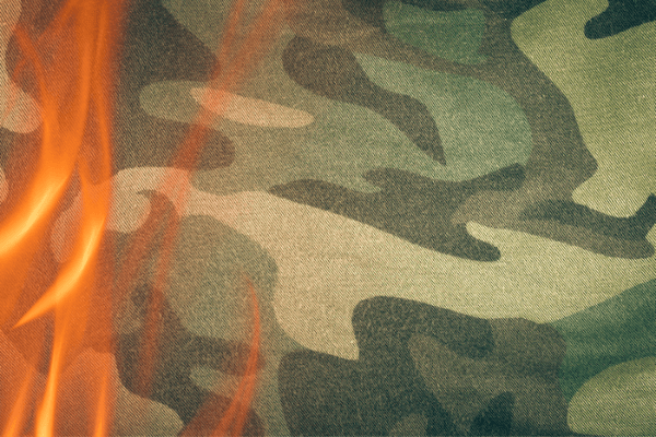 Military print with fire showing fire resistance